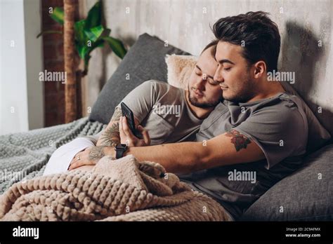 gay men in bed|Homosexual men in bed together Stock Photos and。